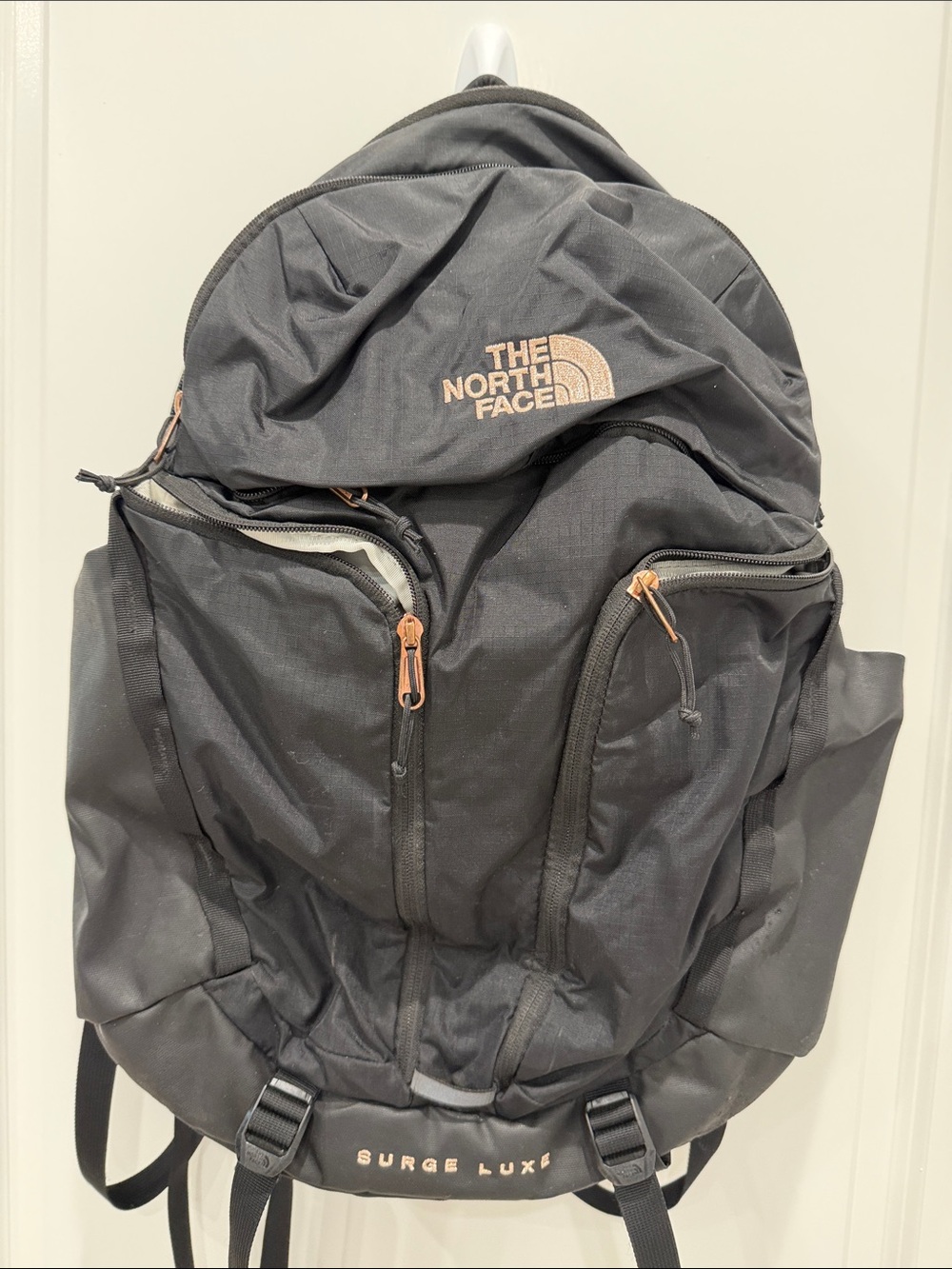 The North Face Black Backpack with Copper Accent Zippers